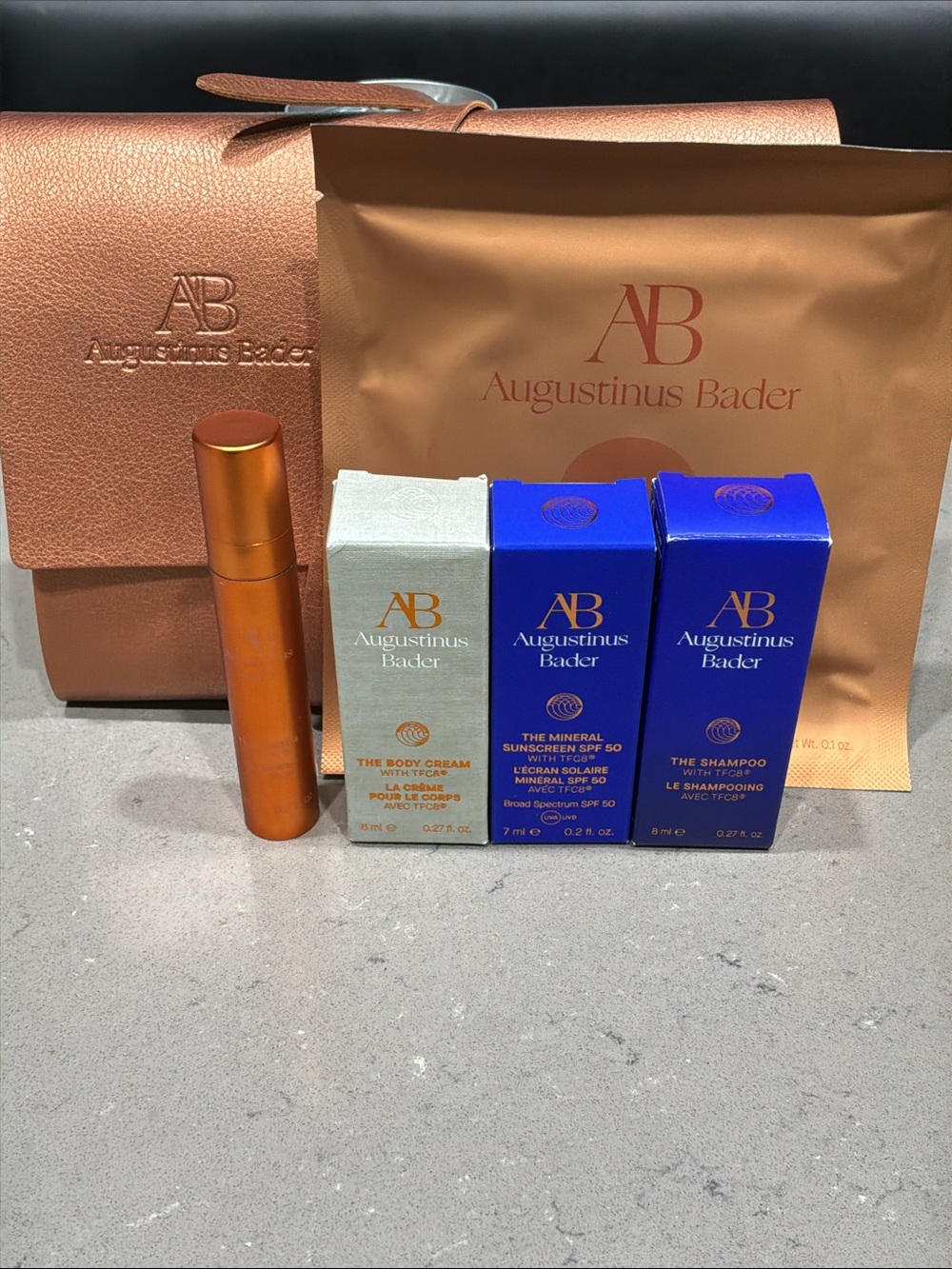 Augustinus Bader Travel Set with Rose Gold Pouch and 3 samples & eye patches